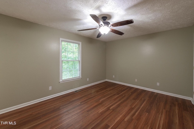 5630 Orebank Rd, Kingsport, TN 37664 - spare room featuring dark wood finished floors, a ceiling fan, and a textured ceiling