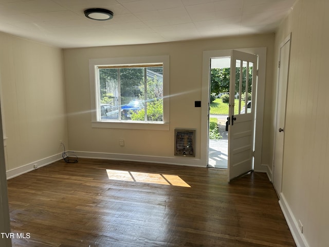 613 Spruce St, Johnson City, TN 37601 - entrance foyer with wood finished floors and heating unit