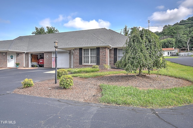 2425 E Lakeview Dr Unit 1, Johnson City, TN 37601 - multi unit property featuring a garage, asphalt driveway, brick siding, and a shingled roof