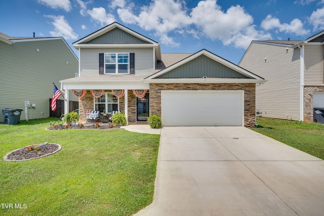 1244 Stamp Lodge Rd, Kingsport, TN 37660 - craftsman-style home with a porch, a front yard, concrete driveway, a garage, and stone siding