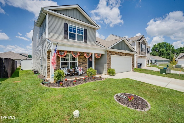 1244 Stamp Lodge Rd, Kingsport, TN 37660 - craftsman house with covered porch, driveway, board and batten siding, a garage, and stone siding