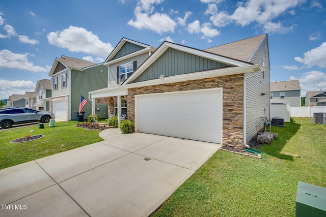 1244 Stamp Lodge Rd, Kingsport, TN 37660 - craftsman house with board and batten siding, stone siding, concrete driveway, an attached garage, and a residential view