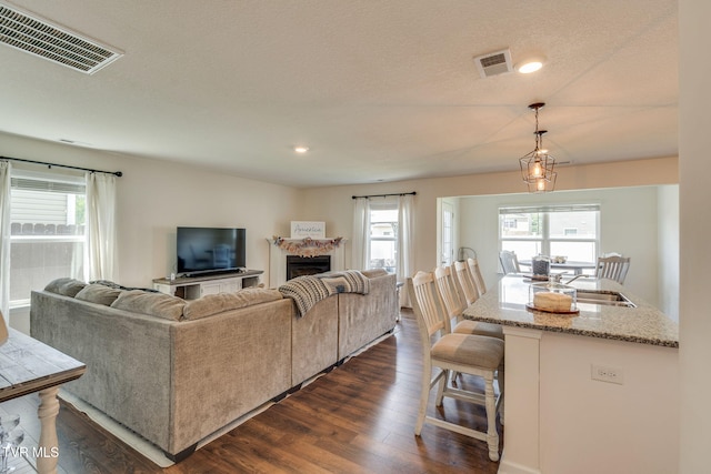 1244 Stamp Lodge Rd, Kingsport, TN 37660 - living room featuring dark wood-type flooring, healthy amount of natural light, and recessed lighting