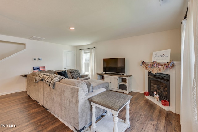 1244 Stamp Lodge Rd, Kingsport, TN 37660 - living room featuring dark wood-style floors and a glass covered fireplace