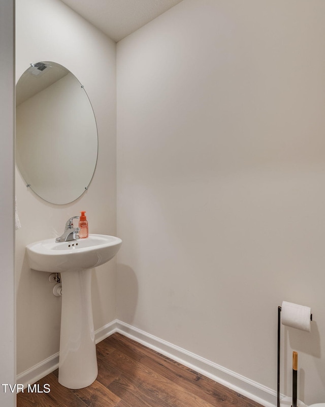 1244 Stamp Lodge Rd, Kingsport, TN 37660 - bathroom with wood finished floors and baseboards