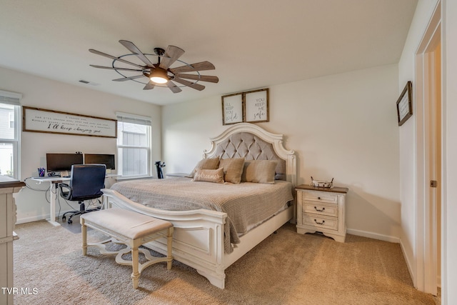 1244 Stamp Lodge Rd, Kingsport, TN 37660 - bedroom featuring multiple windows, a desk, light carpet, and ceiling fan