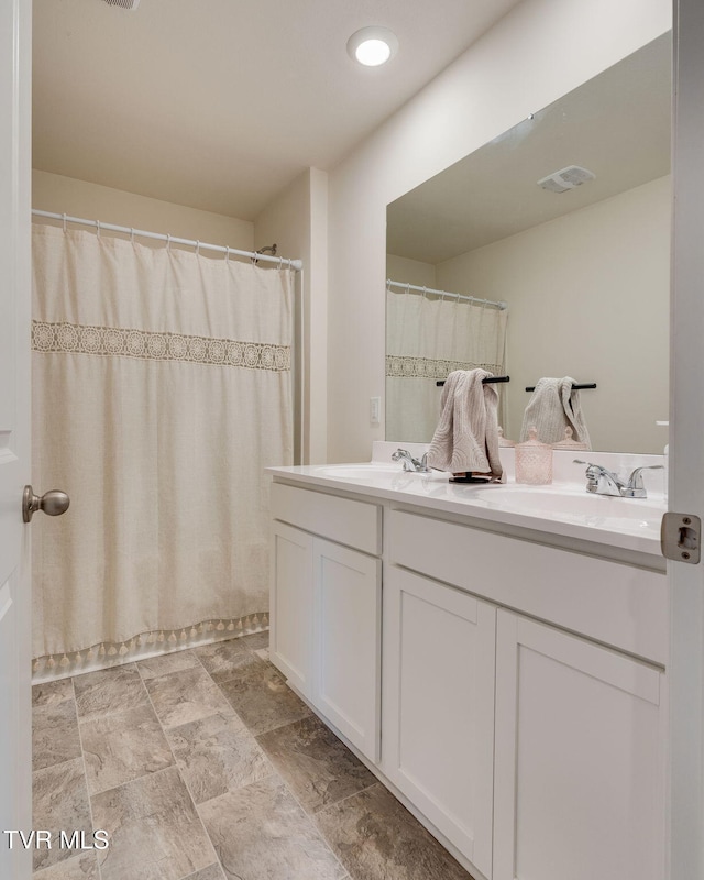 1244 Stamp Lodge Rd, Kingsport, TN 37660 - bathroom with double vanity and a shower with curtain