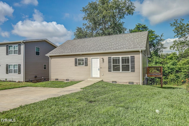 136 W Wilkshire Pl, Bristol, TN 37620 - view of front of home featuring crawl space, a shingled roof, and a front lawn
