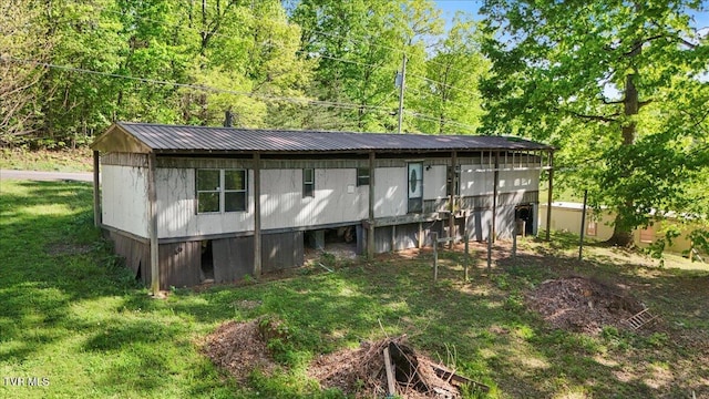 920 Parton Loop, Greeneville, TN 37743 - back of property featuring a metal roof and a lawn