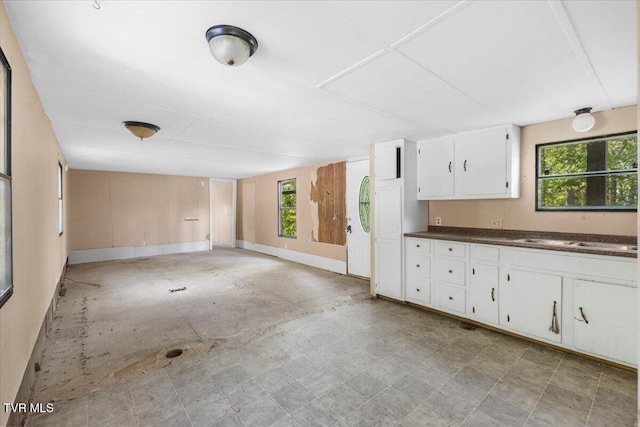 920 Parton Loop, Greeneville, TN 37743 - kitchen featuring dark countertops, white cabinets, and open floor plan