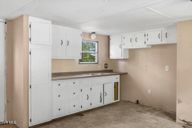 920 Parton Loop, Greeneville, TN 37743 - kitchen featuring dark countertops and white cabinetry