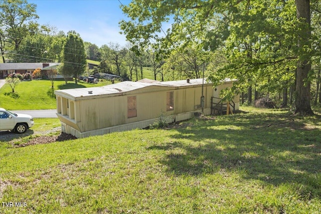 920 Parton Loop, Greeneville, TN 37743 - view of side of property featuring a lawn