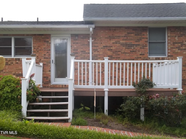 313 Milburn Ave, Kingsport, TN 37660 - back of house featuring brick siding, a shingled roof, and a wooden deck