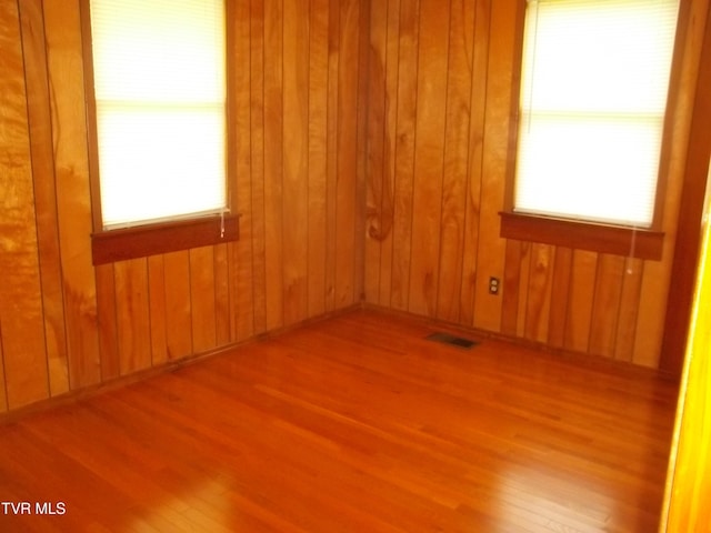 313 Milburn Ave, Kingsport, TN 37660 - empty room with wood finished floors and wood walls