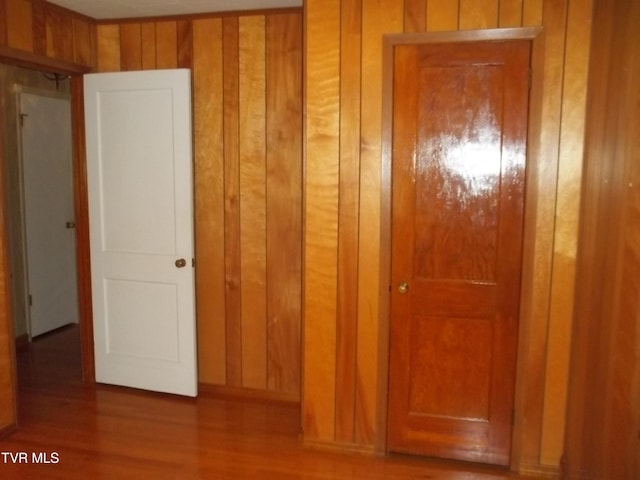 313 Milburn Ave, Kingsport, TN 37660 - hallway featuring wood walls and wood finished floors