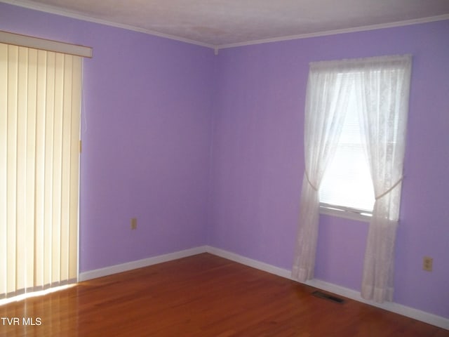 313 Milburn Ave, Kingsport, TN 37660 - empty room featuring wood finished floors and ornamental molding