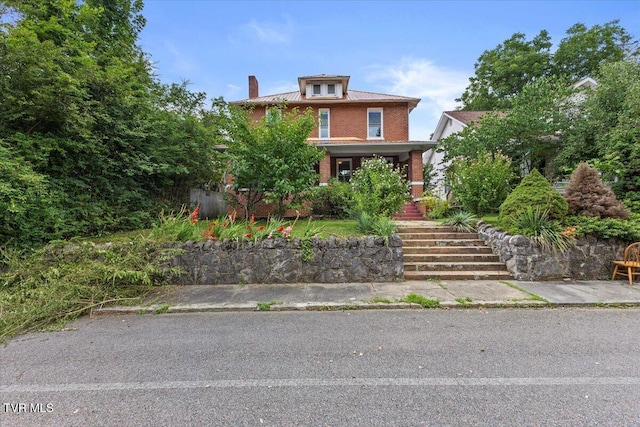909 Highland Ave, Bristol, VA 24201 - traditional style home with stairs, brick siding, and a chimney