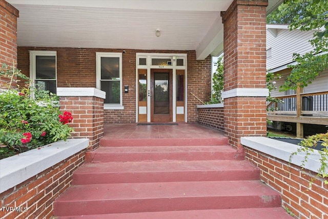 909 Highland Ave, Bristol, VA 24201 - entrance to property featuring covered porch and brick siding