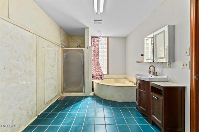 909 Highland Ave, Bristol, VA 24201 - full bathroom featuring a stall shower, a bath, vanity, and tile patterned flooring