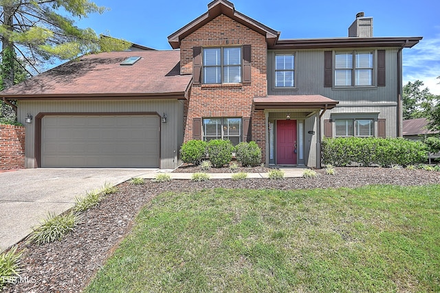 226 Willowbend Ct, Kingsport, TN 37660 - view of front of home with a chimney, a garage, concrete driveway, a front yard, and brick siding