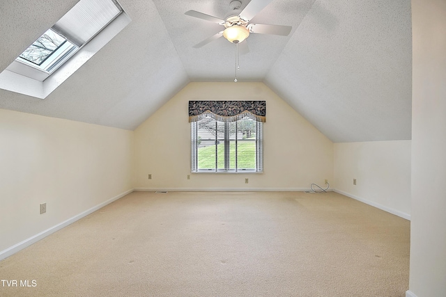 226 Willowbend Ct, Kingsport, TN 37660 - bonus room featuring a textured ceiling, carpet, lofted ceiling, and a skylight