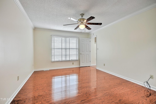226 Willowbend Ct, Kingsport, TN 37660 - spare room featuring a textured ceiling, wood finished floors, crown molding, and ceiling fan