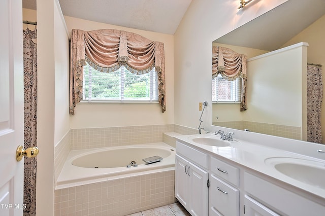 226 Willowbend Ct, Kingsport, TN 37660 - full bath featuring double vanity, a tub with jets, tile patterned flooring, and lofted ceiling