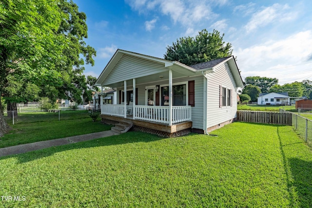 1524 Redwood Dr, Kingsport, TN 37664 - view of front of house featuring a porch, crawl space, and a fenced backyard