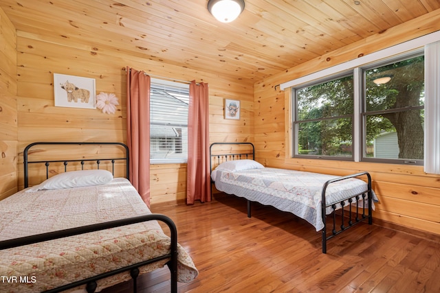 1524 Redwood Dr, Kingsport, TN 37664 - bedroom featuring hardwood / wood-style floors, wood walls, and wooden ceiling