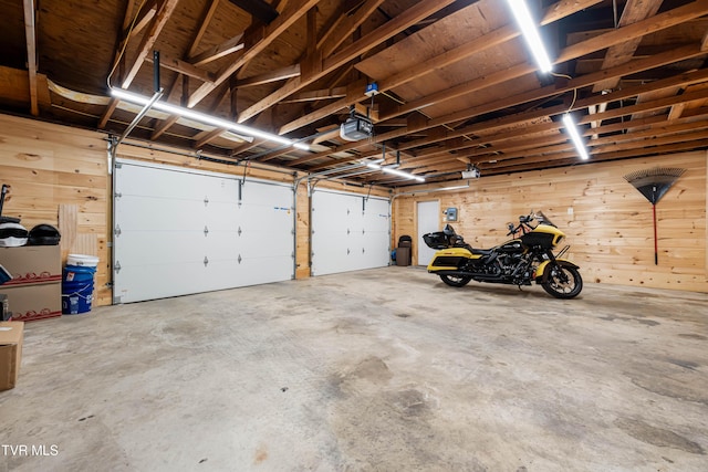 1524 Redwood Dr, Kingsport, TN 37664 - garage featuring a garage door opener and wood walls