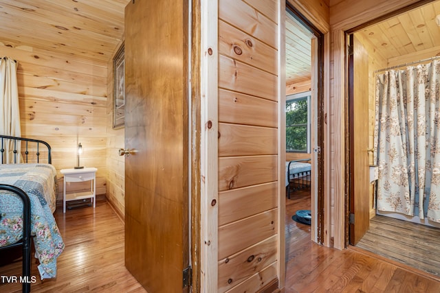 1524 Redwood Dr, Kingsport, TN 37664 - bedroom featuring hardwood / wood-style floors, wood ceiling, and wooden walls