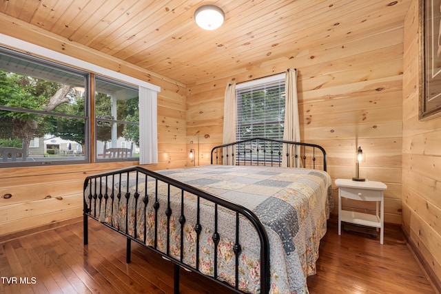 1524 Redwood Dr, Kingsport, TN 37664 - bedroom featuring multiple windows, hardwood / wood-style floors, wood walls, and wood ceiling