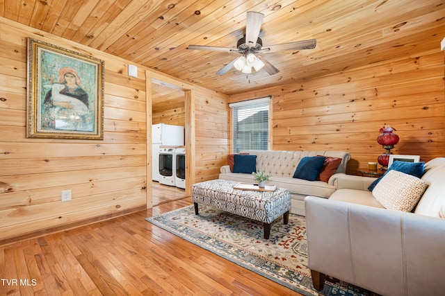 1524 Redwood Dr, Kingsport, TN 37664 - living room with wood ceiling, independent washer and dryer, wooden walls, ceiling fan, and hardwood / wood-style floors
