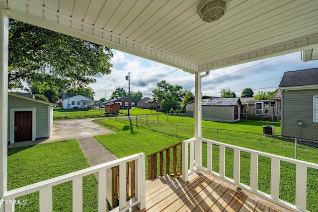 1524 Redwood Dr, Kingsport, TN 37664 - deck with a fenced backyard, a storage unit, and a residential view