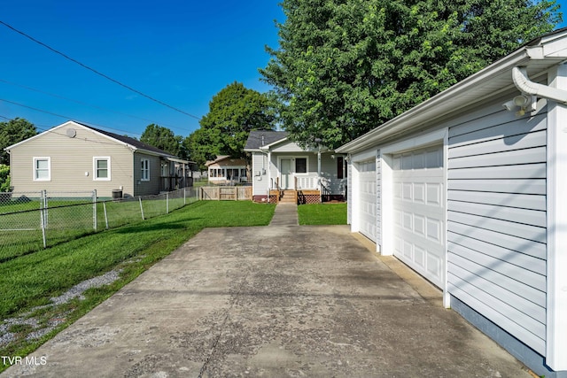 1524 Redwood Dr, Kingsport, TN 37664 - view of yard with a garage and covered porch