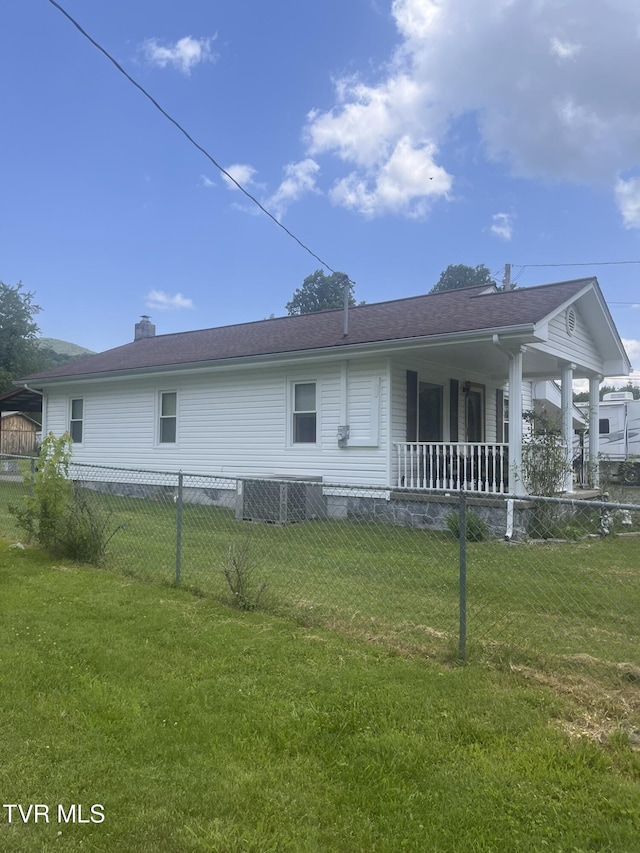 119 Liberty Hollow Rd, Elizabethton, TN 37643 - rear view of house with a chimney and a porch