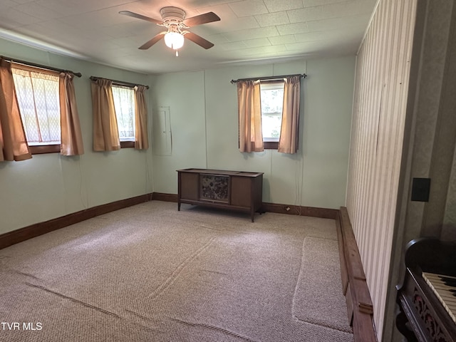 2065 Coeburn Rd, Clintwood, VA 24228 - carpeted empty room with plenty of natural light and ceiling fan