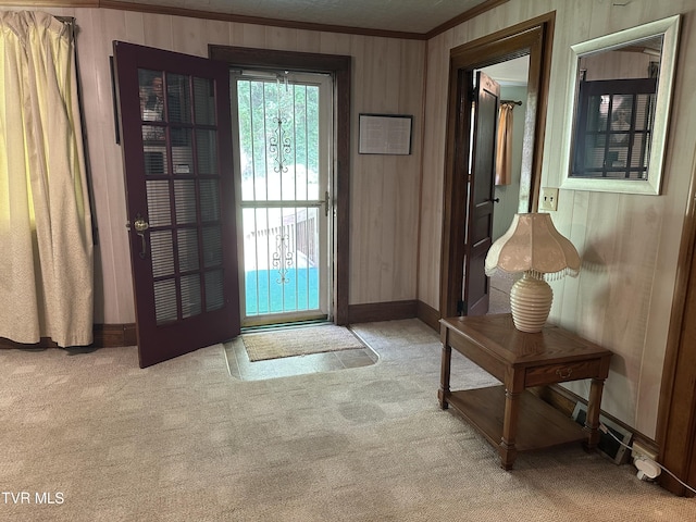 2065 Coeburn Rd, Clintwood, VA 24228 - entryway featuring crown molding, carpet, and wood walls