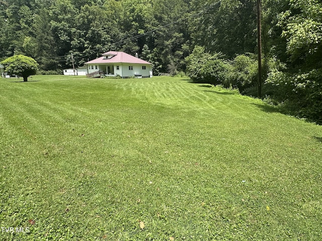 2065 Coeburn Rd, Clintwood, VA 24228 - view of grassy yard featuring a view of trees