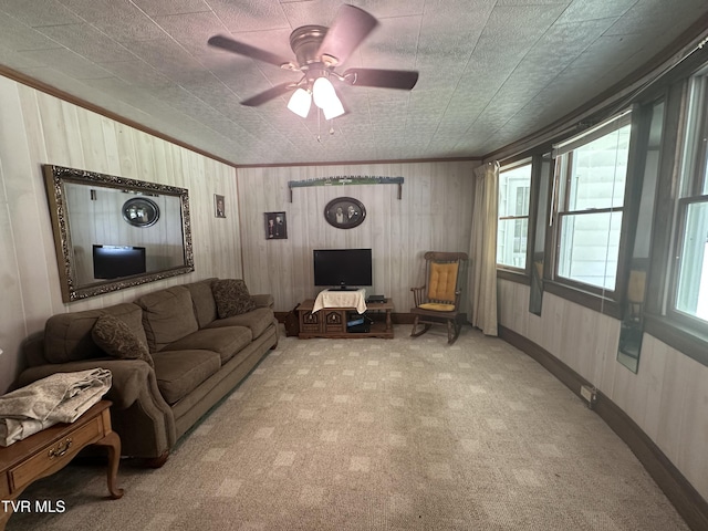2065 Coeburn Rd, Clintwood, VA 24228 - carpeted living area featuring a ceiling fan, ornamental molding, and wooden walls