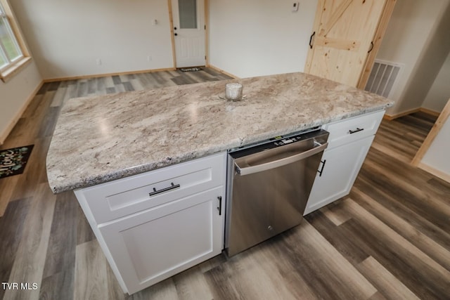 1976 Hartford Rd, Cosby, TN 37722 - kitchen featuring dishwasher, white cabinetry, dark wood-style floors, and light stone countertops