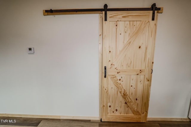 1976 Hartford Rd, Cosby, TN 37722 - detailed view of a barn door and wood finished floors