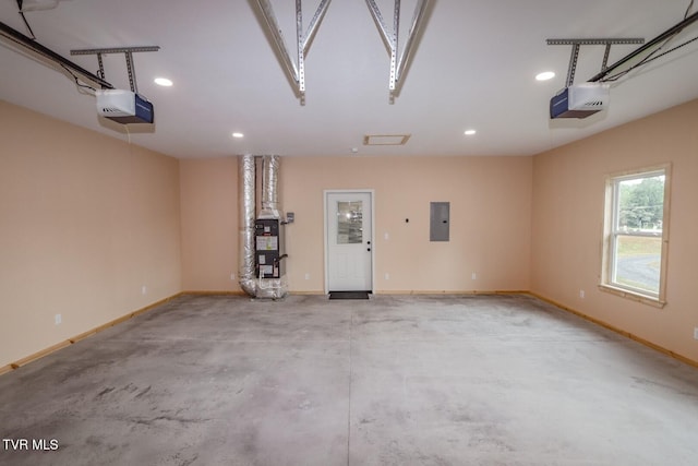 1976 Hartford Rd, Cosby, TN 37722 - garage featuring a garage door opener, recessed lighting, and electric panel