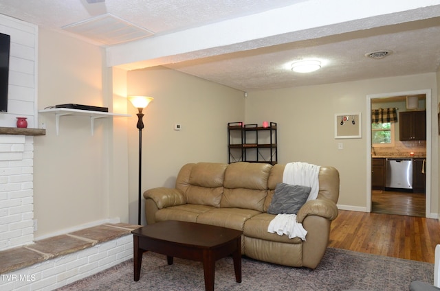 2165 Steadman St, Kingsport, TN 37664 - living room featuring wood finished floors and a textured ceiling