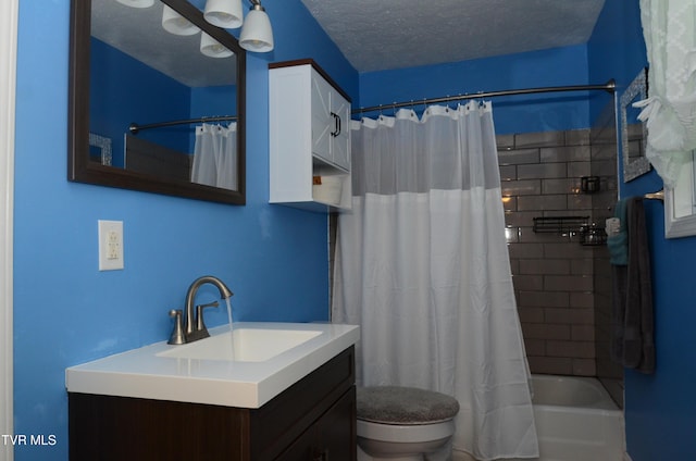 2165 Steadman St, Kingsport, TN 37664 - full bathroom featuring vanity, shower / tub combo, and a textured ceiling