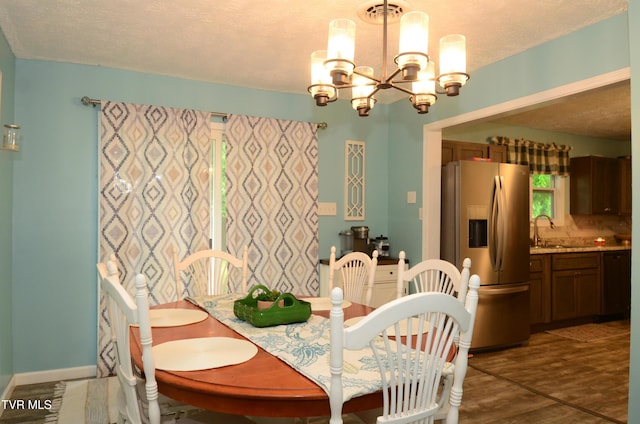 2165 Steadman St, Kingsport, TN 37664 - dining area with a chandelier and wood finished floors
