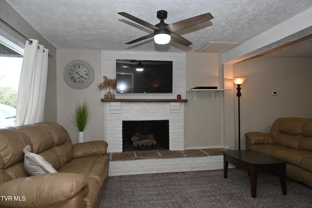 2165 Steadman St, Kingsport, TN 37664 - living area with a ceiling fan, a textured ceiling, a brick fireplace, and carpet flooring