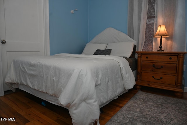 2165 Steadman St, Kingsport, TN 37664 - bedroom with dark wood-type flooring