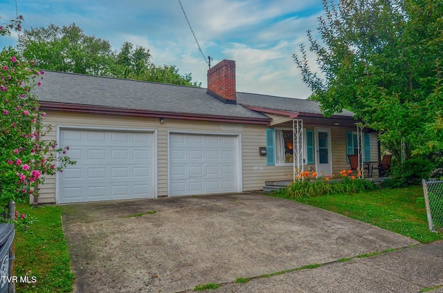 2165 Steadman St, Kingsport, TN 37664 - ranch-style home with a garage, driveway, a chimney, covered porch, and roof with shingles