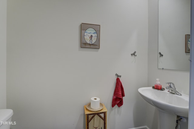 5402 Wildlife Cir, Piney Flats, TN 37686 - bathroom featuring toilet and baseboards